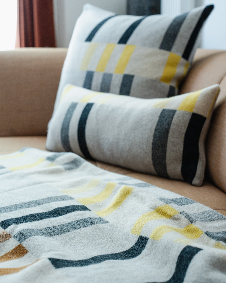 ALBERS BOLSTER CUSHION - CREAM / BLACK / YELLOW / MARBLE / PLUM